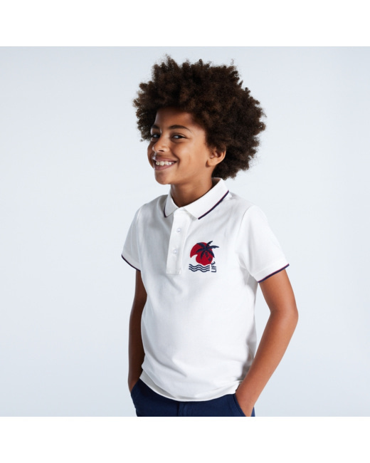 Polo en jersey piqué motif palmier blanc garçon
