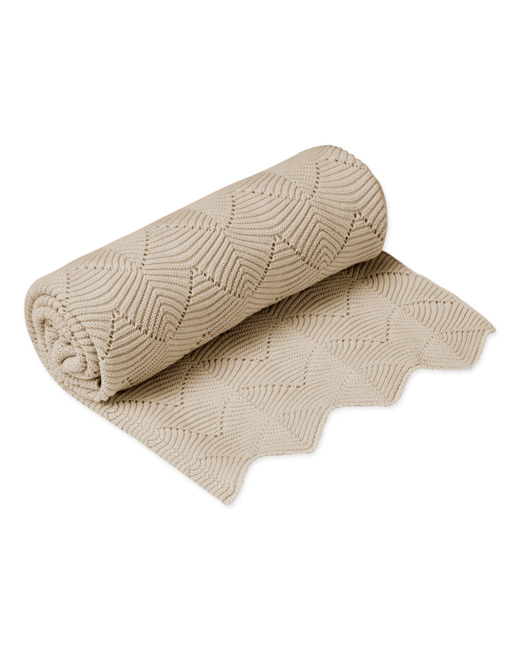 Couverture en tricot à festons