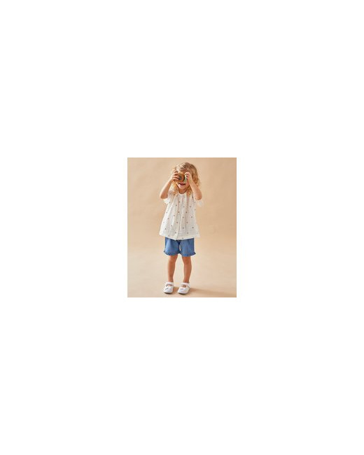 Set blouse imprimé soleils + short denim