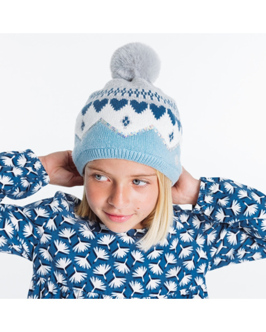 Bonnet jacquard à pompon bleu fille